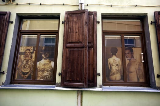 A tatoo Shop in the old Town of the City Vilnius in the Baltic State of Lithuania