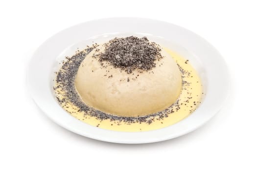 Germknödel,sweet dessert with vanilla sauce on a white plate