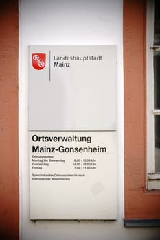 Mainz,Germany - March 22,2014: The entrance sign of the local administration in Mainz Gonsenheim with the opening hours on March 22,2017 in Mainz.