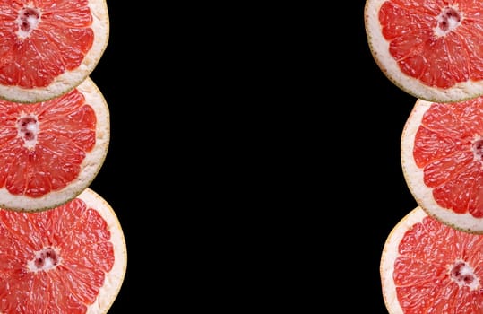 isolated red fresh grapefruit cuts black background with free space
