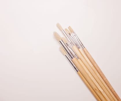 bunch of brushers on white table background