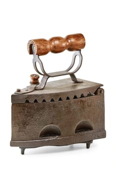 Old Smoothing Iron Over The White Background