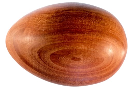 Easter egg made of wood exposed to white