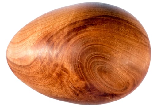 Easter egg made of wood exposed to white