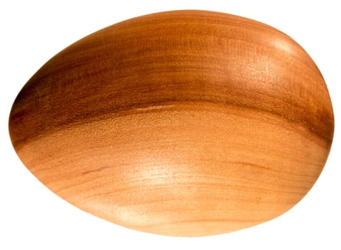 Easter egg made of wood exposed to white