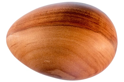 Easter egg made of wood exposed to white