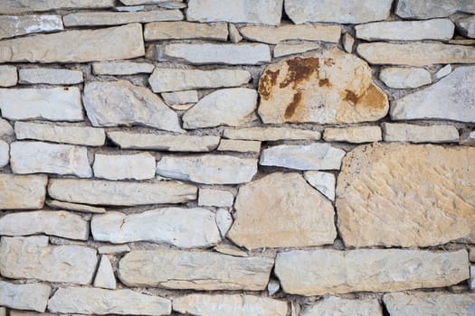 Stone wall. Outdoor background natural stone - sandstone