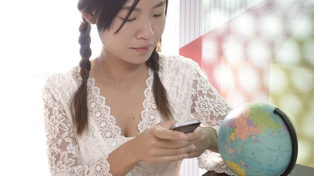 Women explore the globe to plan their travel