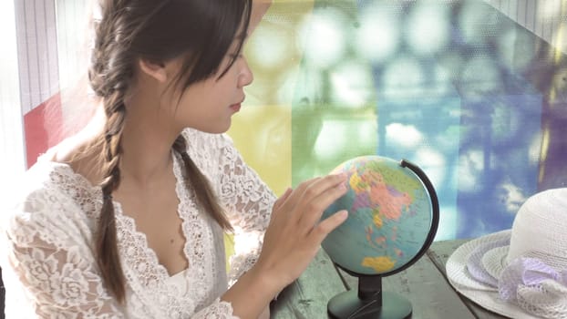 Women explore the globe to plan their travel
