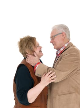 A very happy senior citizen couple looking smiling at each other in love,.isolated for white background..