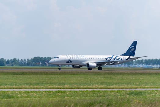 SCHIPHOL, NETHERLANDS - JUNE 4, 2016: A KLM Skyteam plane takes off at amsterdam international airport. SkyTeam is an alliance between different global airlines