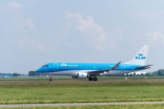 SCHIPHOL, NETHERLANDS - JUNE 4, 2016: KLM airplane takes off at amsterdam international airport. There are 163 destinations served by KLM