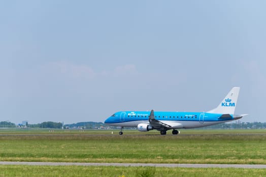 SCHIPHOL, NETHERLANDS - JUNE 4, 2016: KLM airplane takes off at amsterdam international airport. There are 163 destinations served by KLM