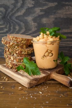 Hummus with fresh Kuerbiskern wholemeal bread