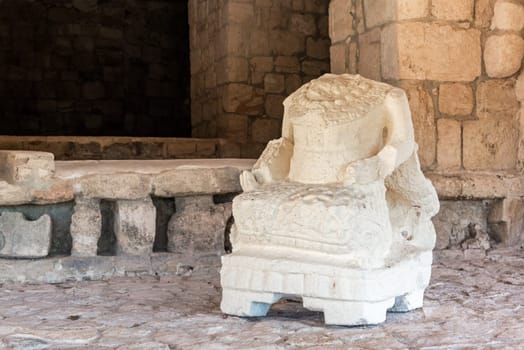 Headless statue in the Mayan ruins of Ek Balam near Valladolid, Mexico