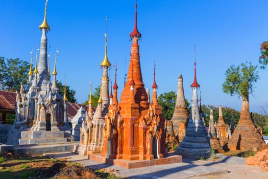 Ruins of ancient Burmese Buddhist pagodas Nyaung Ohak in the village of Indein on Inlay Lake in Shan State, Myanmar, Burma)