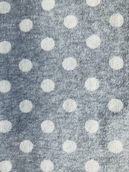 Textile fabric background. Ð¡asual simple everyday dotted polka clothers