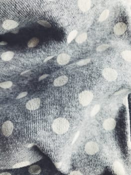 Textile fabric background. Ð¡asual simple everyday dotted polka clothers
