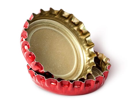 Closeup of two red caps from beer bottles isolated on white background