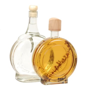 Two bottles of alcohol beverage isolated on white background.