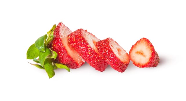 In front sliced fresh juicy strawberries isolated on white background