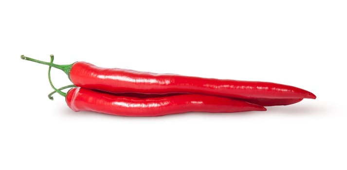 Heap of red chilli peppers isolated on white background