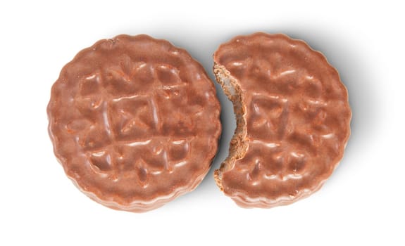 Whole And Bitten Off Chocolate Cookies Lying Next Isolated On White Background