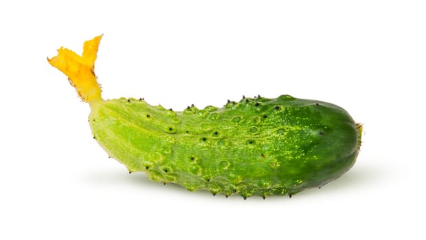 Juicy green cucumber isolated on white background
