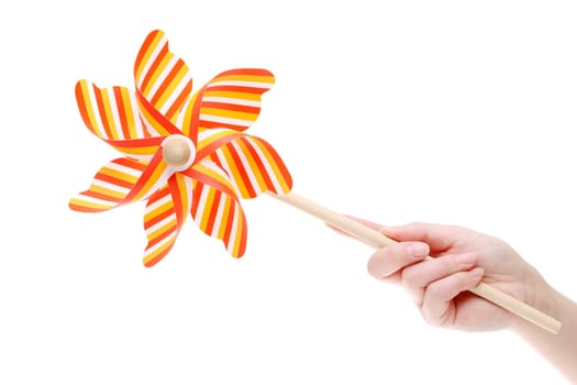 Colorful toy pinwheel windmill on white background