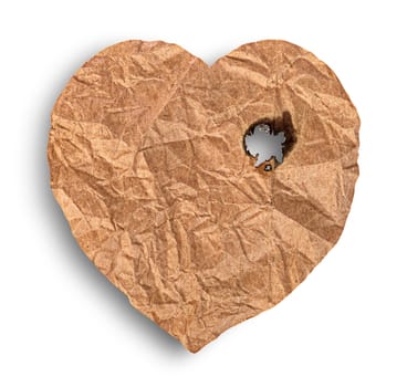 Scorched crumpled paper heart isolated on white background