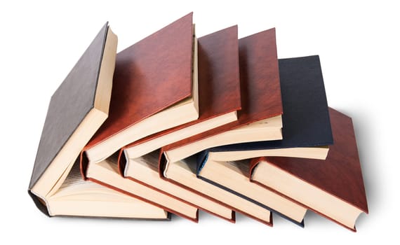 Six old books imbedded in one another top view isolated on white background