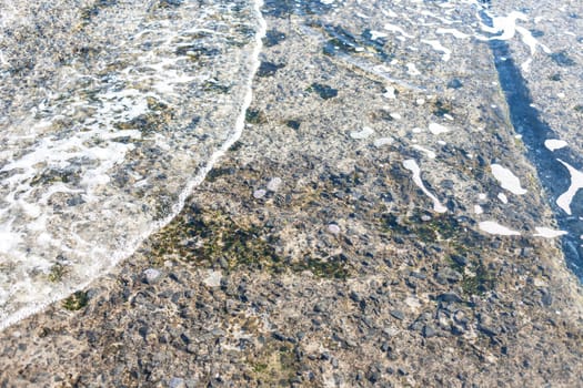 Soft wave of Black sea on sandy beach. Nature Background