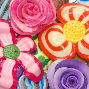 These are unique, handmade colorful jewels from plasticine.