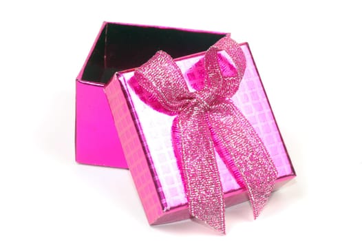 The pink gift box is on white background.