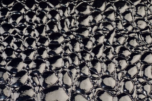 The black lacquered leather is as texture background.