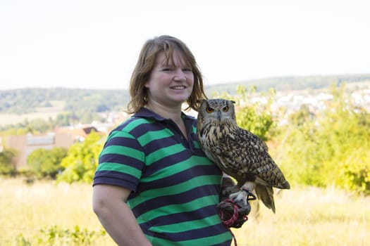 Young female keeps Indian eagle owl female