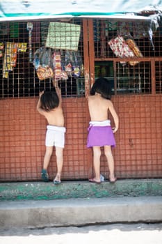 Cebu, Philippines - October 01, 2014. Children play in the yard. Everyday life of filipinos