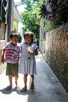 Cebu, Philippines - October 01, 2014. Children play in the yard. Everyday life of filipinos