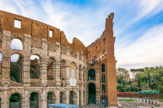 view on the Great Roman Colosseum Coliseum, Colosseo ,also known as the Flavian Amphitheatre. Famous world landmark. Scenic urban landscape. Rome. Italy. Europe