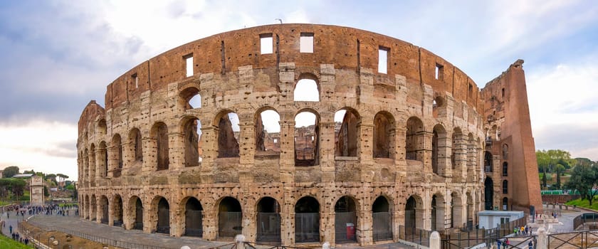 view on the Great Roman Colosseum Coliseum, Colosseo ,also known as the Flavian Amphitheatre. Famous world landmark. Scenic urban landscape. Rome. Italy. Europe
