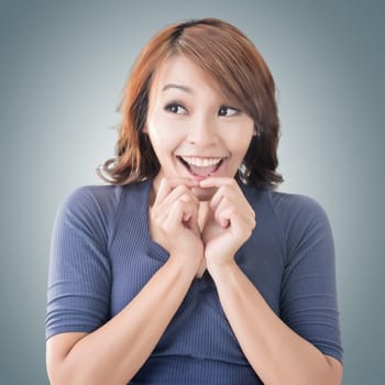 Surprised Asian woman, closeup portrait.