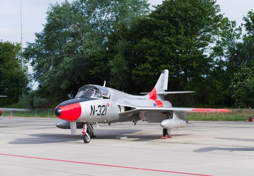 LEEUWARDEN, NETHERLANDS - JUNI 10 2016:  Hawker Hunter T.8C G-BWGL/N-321 fighter at the air force days in Leeuwarden