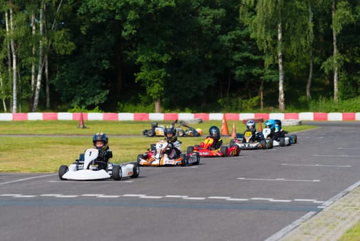 OLDENZAAL, NETHERLANDS - JUNE 7, 2016: Kids in karts waiting for the launch