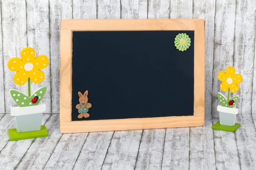 Decorative wooden flowers with empty panel