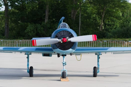 LEEUWARDEN, NETHERLANDS - JUNE 10, 2016: parked Yak-52 at the dutch air force open days