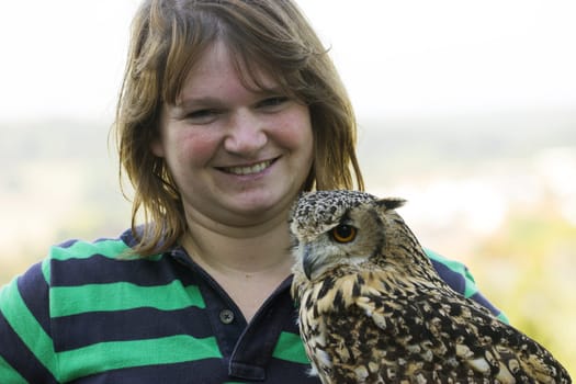 Young female keeps Indian eagle owl female