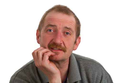 Man supports face on fist exposed on white background