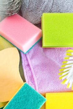 Colorful household sponges in detail as a background