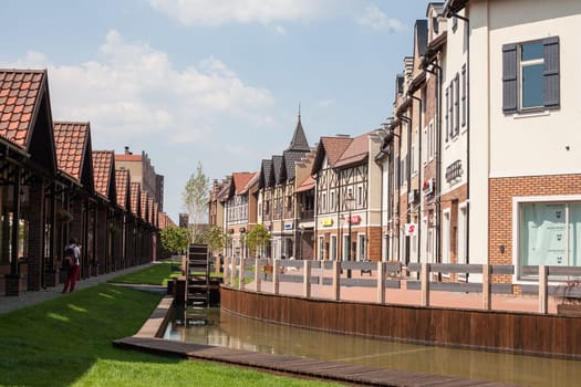 Kyiv, Ukraine - July 31, 2014: Village outlet Manufacture, dutch village with shops, modern architecture in fachwerk style