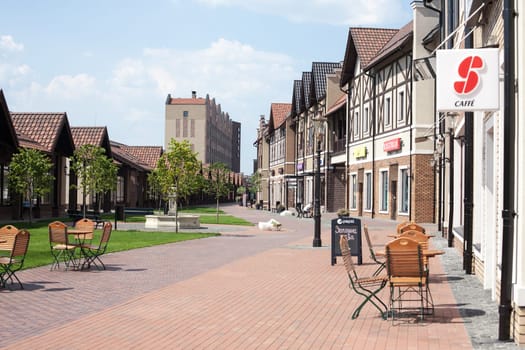 Kyiv, Ukraine - July 31, 2014: Village outlet Manufacture, dutch village with shops, modern architecture in fachwerk style